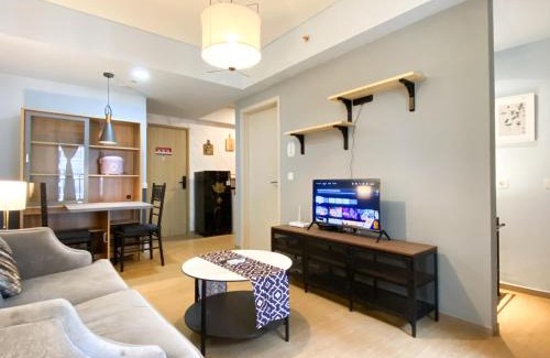 Cikarang Apartment | Cozy Designed 2BR with Working Room at Meikarta Apartment By Travelio