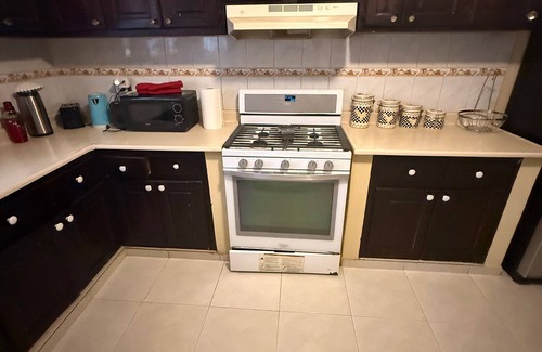 Santiago de los Caballeros House | Cozy 3BR Gurabo home with projector, A/C, near trails, dining & The Monument.