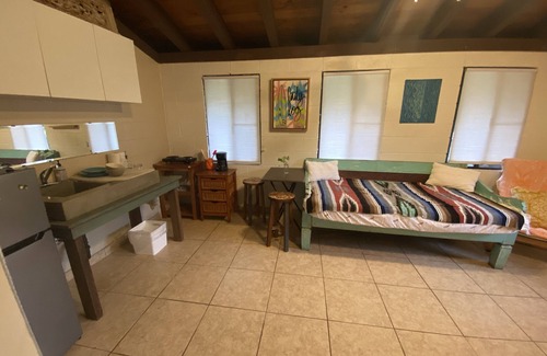 Haleiwa House | Cozy downstairs Apartment located one block from beach in V-land.