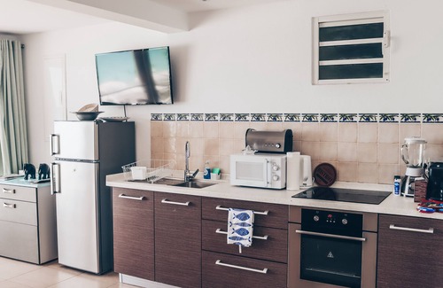 Grand Case Apartment | Cozy, family friendly apartment on the Beach, with panoramic view of the ocean