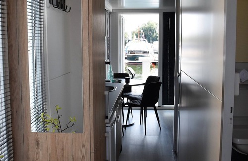 Heugum Boat Rental | Cozy floating Boatlodge, Athens, 4 persons, 2 bedrooms Maastricht
