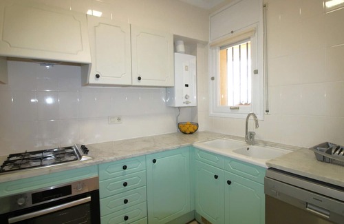 Llanca Apartment | Cozy Ground Floor Apartment with Garden, 150m from Cap Ras Beaches