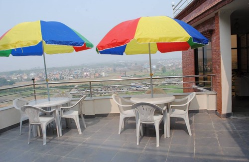 Madhyapur Thimi Hotel | Cozy Guest Room in Manohara Pvt Ltd - Room for 4 Guests