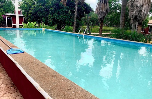 Homun Apartment | Cozy hotel suite in pleasant Homún with WiFi, AC