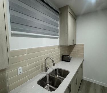 Airdrie Apartment | Cozy Inn new basemt wt sep entrance contains 1 bdrm and den for up to 4 guests