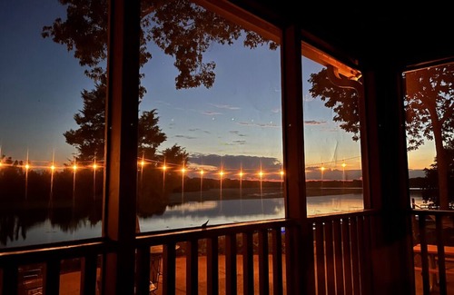 Town Creek Cabin | Cozy Lakeside Cabin w/Private Doc, Pool, & Screened In Porch!
