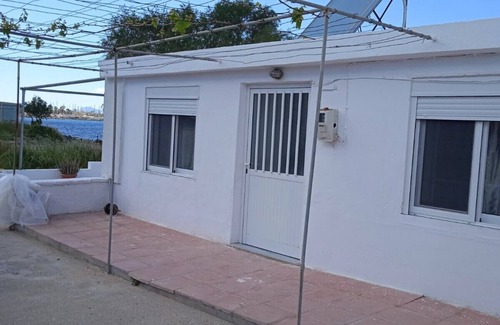 Paradisi House | Cozy little home next to the Sea with a patio