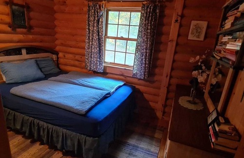 West Bay House | Cozy log cabin with fantastic views and 2 bathrooms