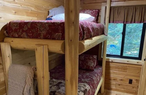 Gould City House | Cozy LOG CABIN in the woods