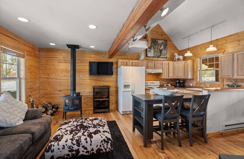 Glenwood Springs House | Cozy Log Cabin located on scenic acreage with trees and privacy.