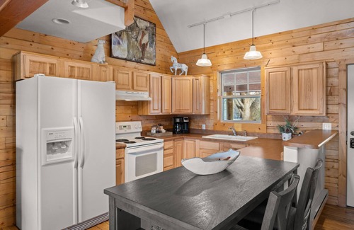 Glenwood Springs House | Cozy Log Cabin located on scenic acreage with trees and privacy.