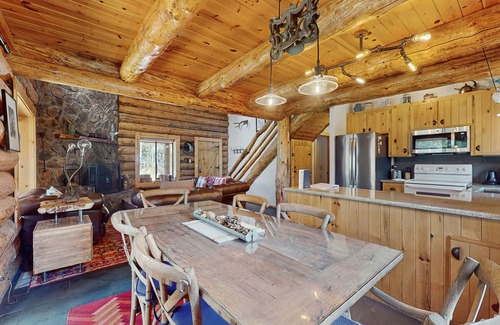 Oregon Water Wonderland Cabin | Cozy log cabin with wrap-around porch, Hot tub Loft space, Washer & Dryer