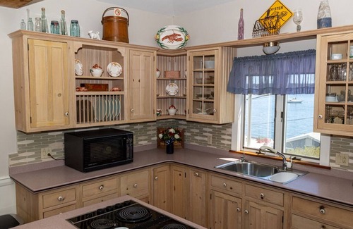 Five Islands Cottage | Cozy Ocean Side Cottage with screened in Sun room! 5 minutes from Private beach