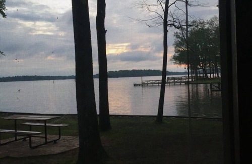 Houston House | Cozy on the lake lodging with kayaking and fishing supplies furnished.