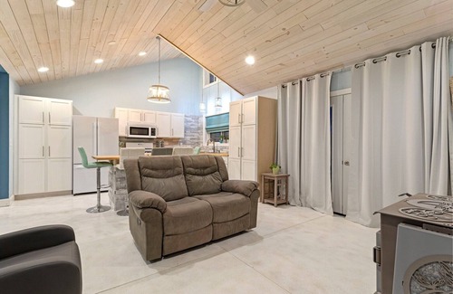 Mora House | Cozy one level - open floor plan, split bedrooms, in-floor heat, wood stove