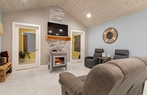 Mora House | Cozy one level - open floor plan, split bedrooms, in-floor heat, wood stove
