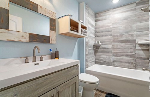 Mora House | Cozy one level - open floor plan, split bedrooms, in-floor heat, wood stove