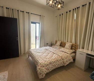 Ajman House | Cozy Peaceful Single Room with Balcony and Attached Washroom