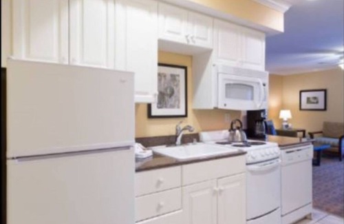 Carlsbad Village Resort | Cozy resort in lovely Carlsbad WALK TO BEACH, wifi, fitness room, FREE parking