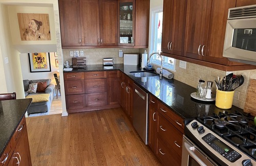 Huntington House | Cozy retreat with fenced in yard—centrally located in the heart of Long Island.