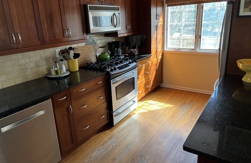 Huntington House | Cozy retreat with fenced in yard—centrally located in the heart of Long Island.