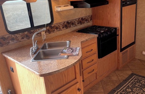 Cope House | Cozy RV on working ranch in Akron/Otis area with AC