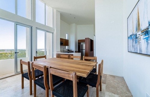 Miramar Apartment | Cozy seaside retreat with shared pool, gym, and stunning views