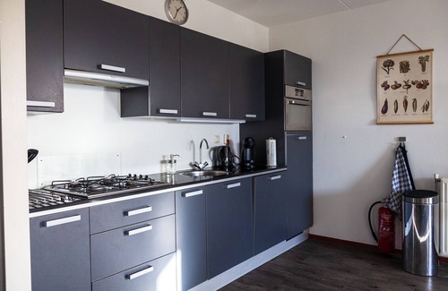 Callantsoog Apartment | Cozy spacious apartment with its own garden at the foot of the dunes.