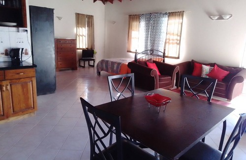 Roseau Apartment | Cozy studio apartments with beautiful garden and ocean view. Self contained.