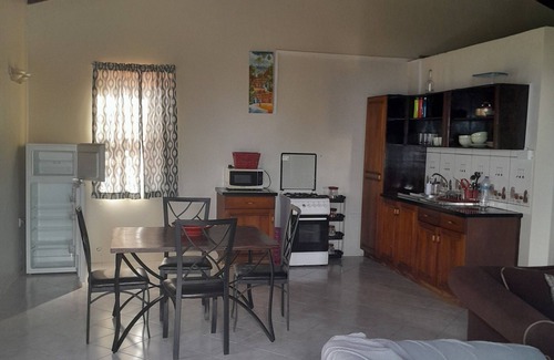 Roseau Apartment | Cozy studio apartments with beautiful garden and ocean view. Self contained.