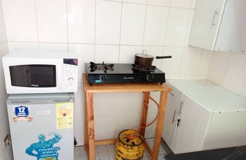 Kigali Apartment | Cozy studio centrally located in Kigali with WiFi, hot shower.