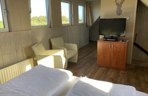 Zonnemaire Other | Cozy sunny apartment, 2 pax with large garden, near Grevelingen sea, WiFi