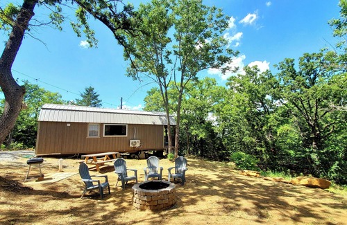 Mead Cabin | Cozy tiny cabin nested in the trees in a lake community, peaceful countryside.