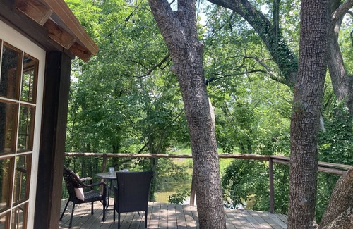 Willis House | Cozy Treehouse on Lake Conroe w/large nest deck with a creek view
