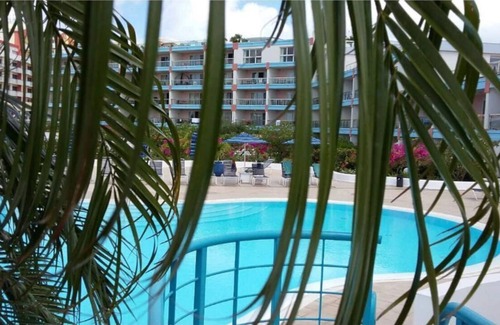 Maho Condo | Cozy Tropical Nest - Steps Near Maho Beach with a Pool & Jacuzzi