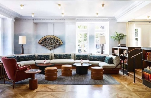 Mount Vernon House | Cozy Up in Baltimore: Artistic Boutique Hotel with Karaoke Rooms & Valet Parking