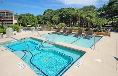 Folly Field Condo | Cozy Villa with Private Balcony, Shared Pool & Hot Tub - Walk to the Beach