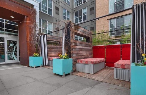 Mill District Apartment | CozySuites Mill District with pool, gym #01