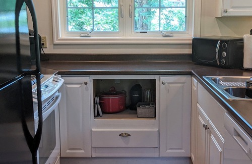 Brevard House | Creek on 1 acre lot walking distance to Downtown
