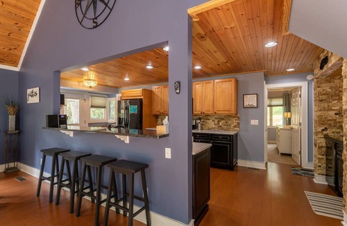 Newland House | Creekside Cabin in Linville with seasonal views of lake, golf access and large deck with hot tub!