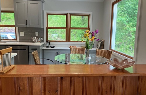 Woxall House | Creekside Retreat-spacious cottage nestled in the wildflowers and lush woods