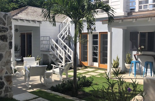 Dunmore Town House | Crown Affair: Village Compound on Charming Lane with 40' Pool & Sunset Views