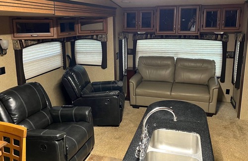 Ashburn House | Cruiser Travel Trailer fully hooked up and ready for you to enjoy!