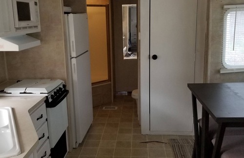 Benzonia House | Crystal Camper - Large Two Bedroom Spacious RV w/Wooded Trail