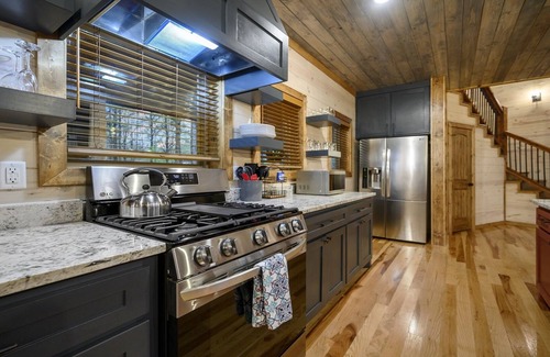 Hochatown Cabin | Custom Escape Perfect for Unforgettable Getaways w/Hot Tub, Firepit, & Games