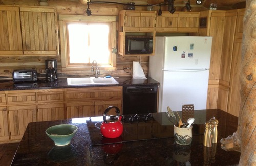 Clawson Cabin | Custom Log Cabin with Teton Views and Hot tub near National Parks