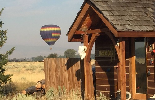 Clawson Cabin | Custom Log Cabin with Teton Views and Hot tub near National Parks
