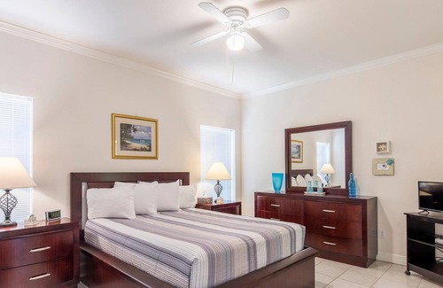 South Padre Island Condo | Cute Coastal Condo with Sparkling Pool! Walk to Beach in minutes!