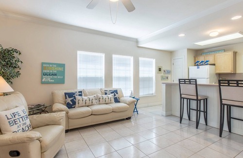 South Padre Island Condo | Cute Coastal Condo with Sparkling Pool! Walk to Beach in minutes!