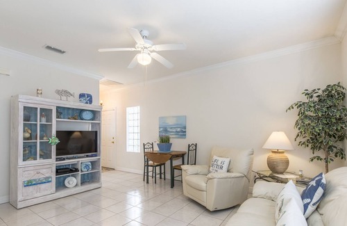 South Padre Island Condo | Cute Coastal Condo with Sparkling Pool! Walk to Beach in minutes!